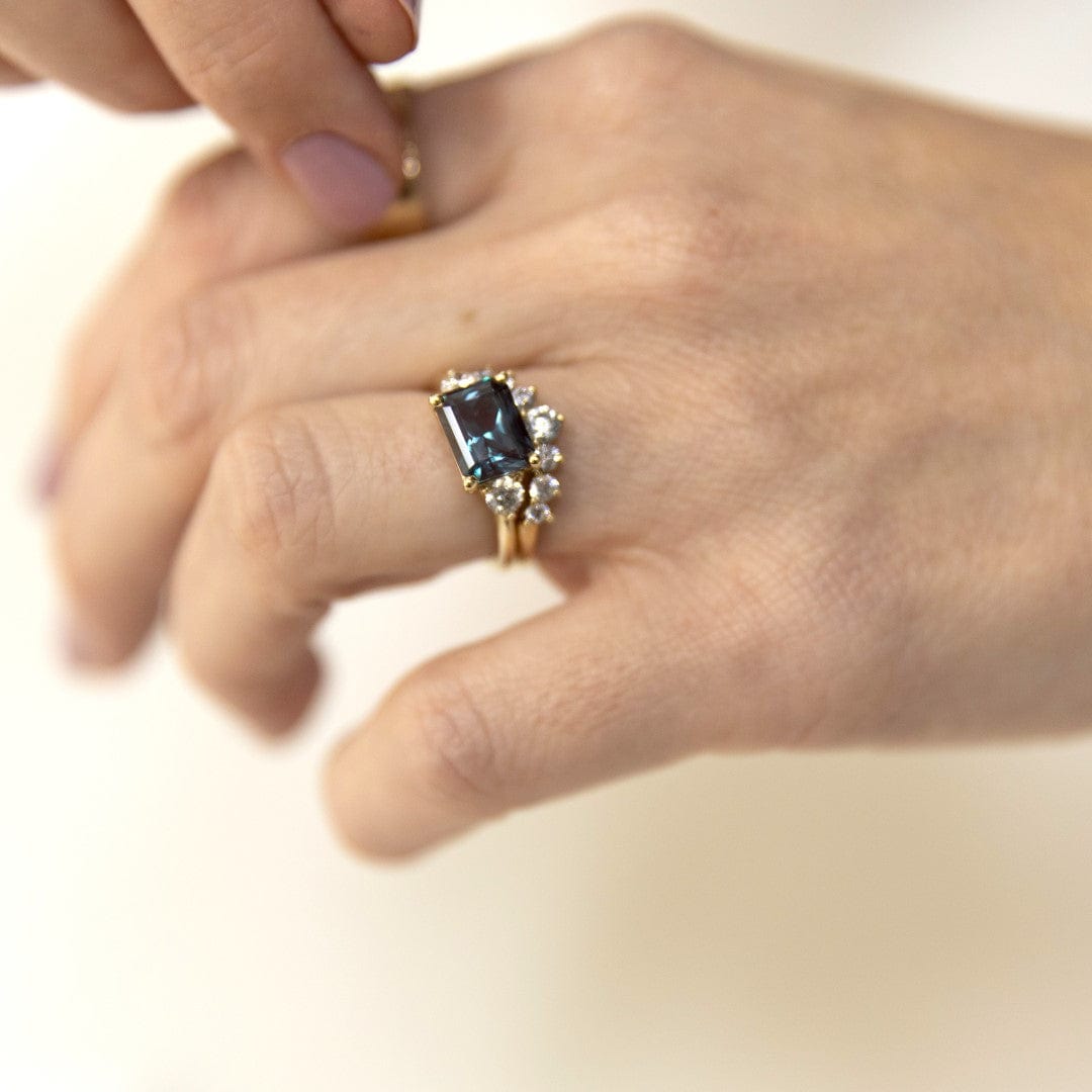 alexandrite east west radiant cut and diamond engagement ring yellow gold