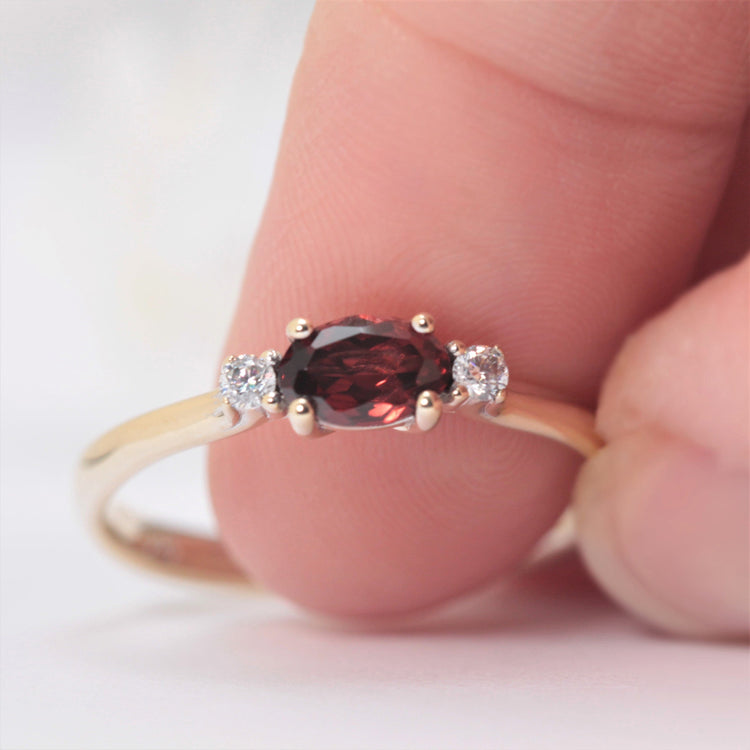 garnet and diamond engagement ring in yellow gold