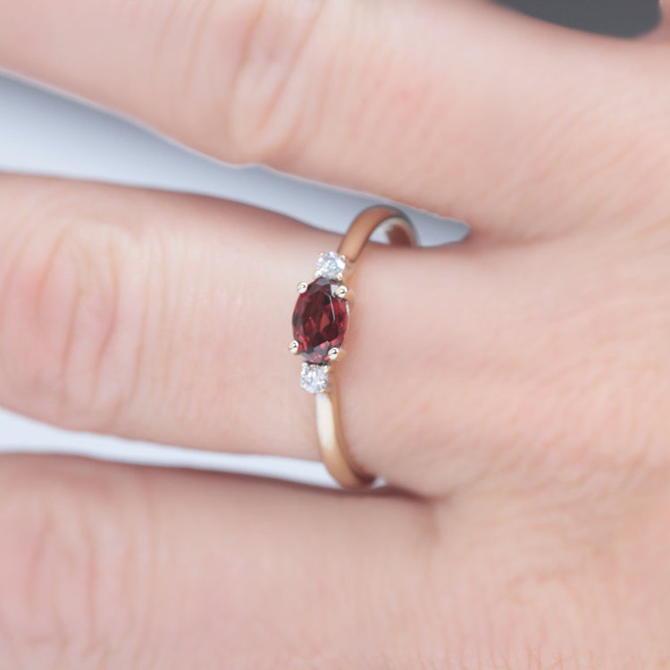 garnet and diamond engagement ring in yellow gold