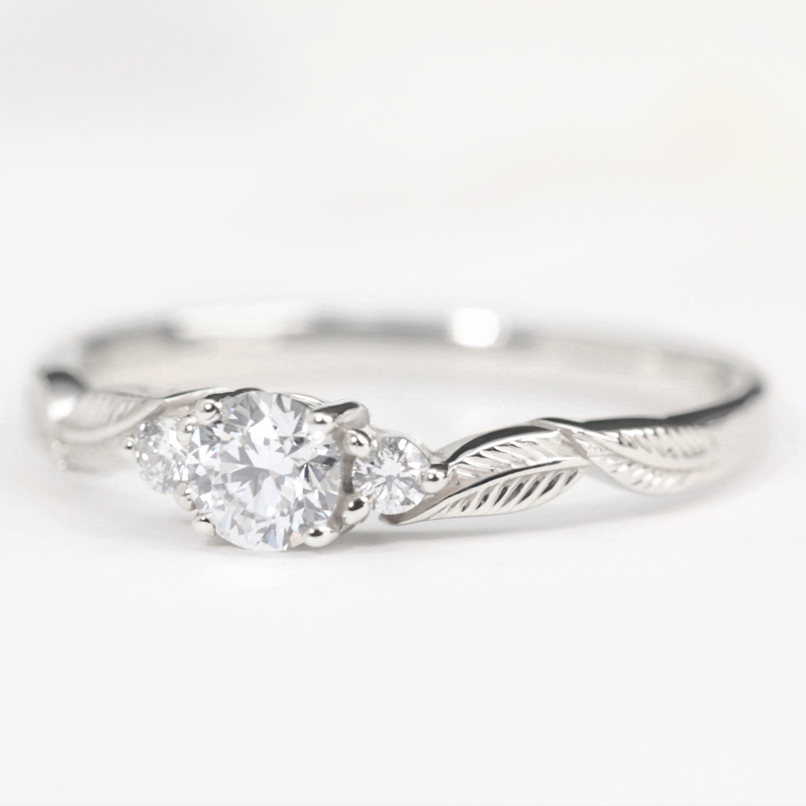 three diamond leaf engagement ring white gold