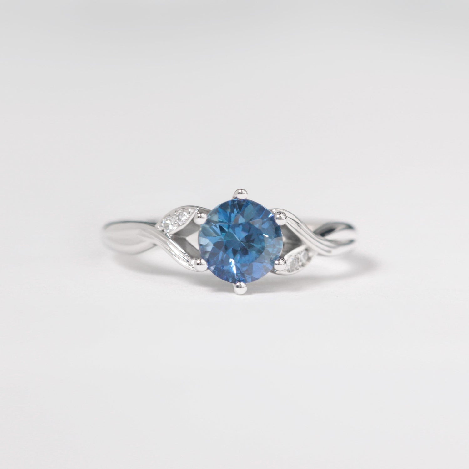blue sapphire twig engagement ring with diamonds white gold