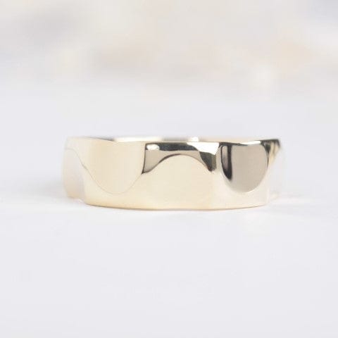 gents yellow gold faceted wedding band