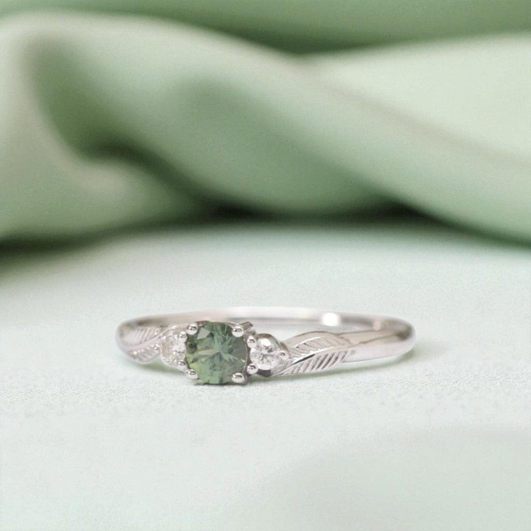 green sapphire leaf engagement ring white gold