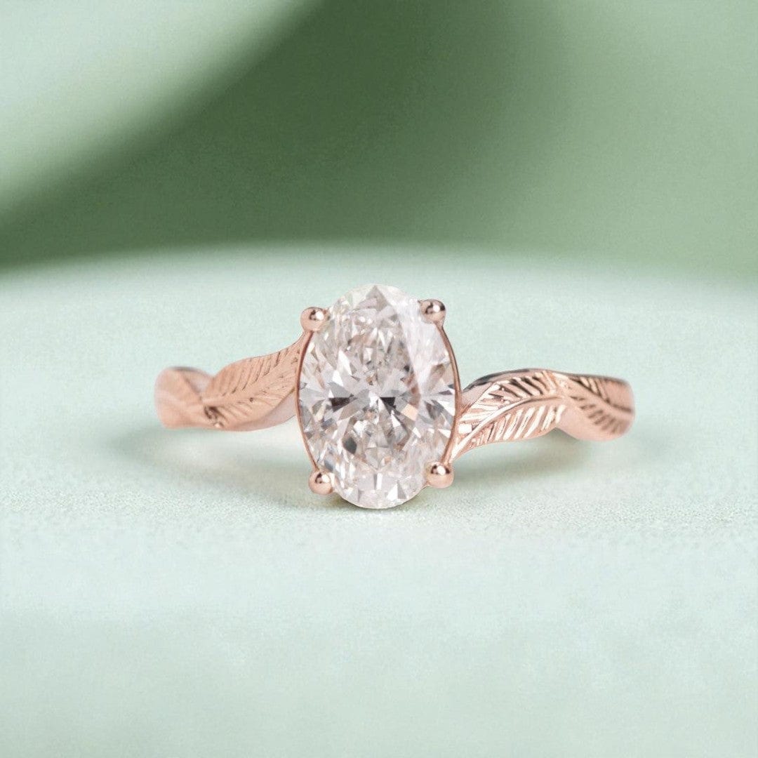 oval-diamond-leaf-engagement-ring-rose-gold