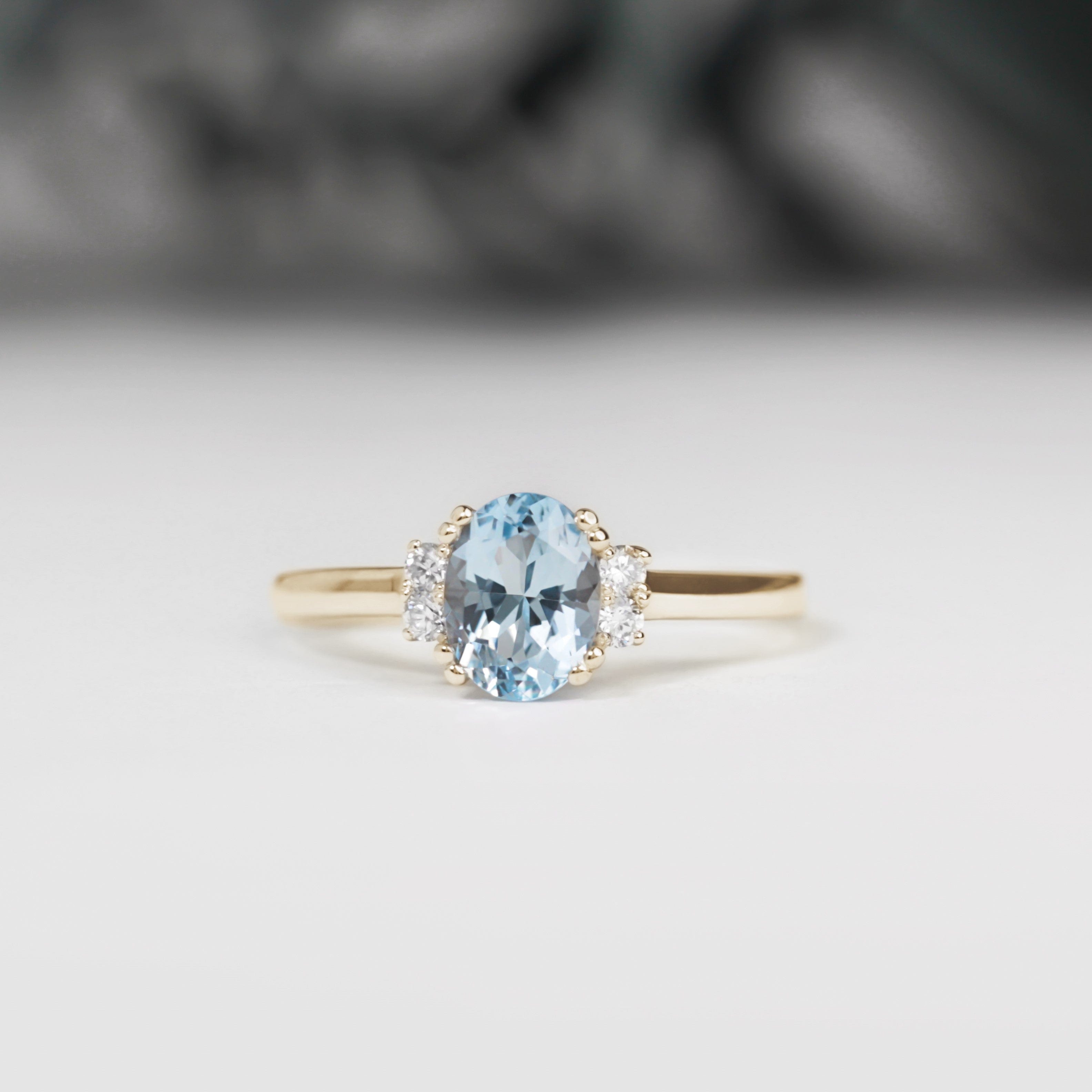 Oval Aquamarine and Diamond Ring