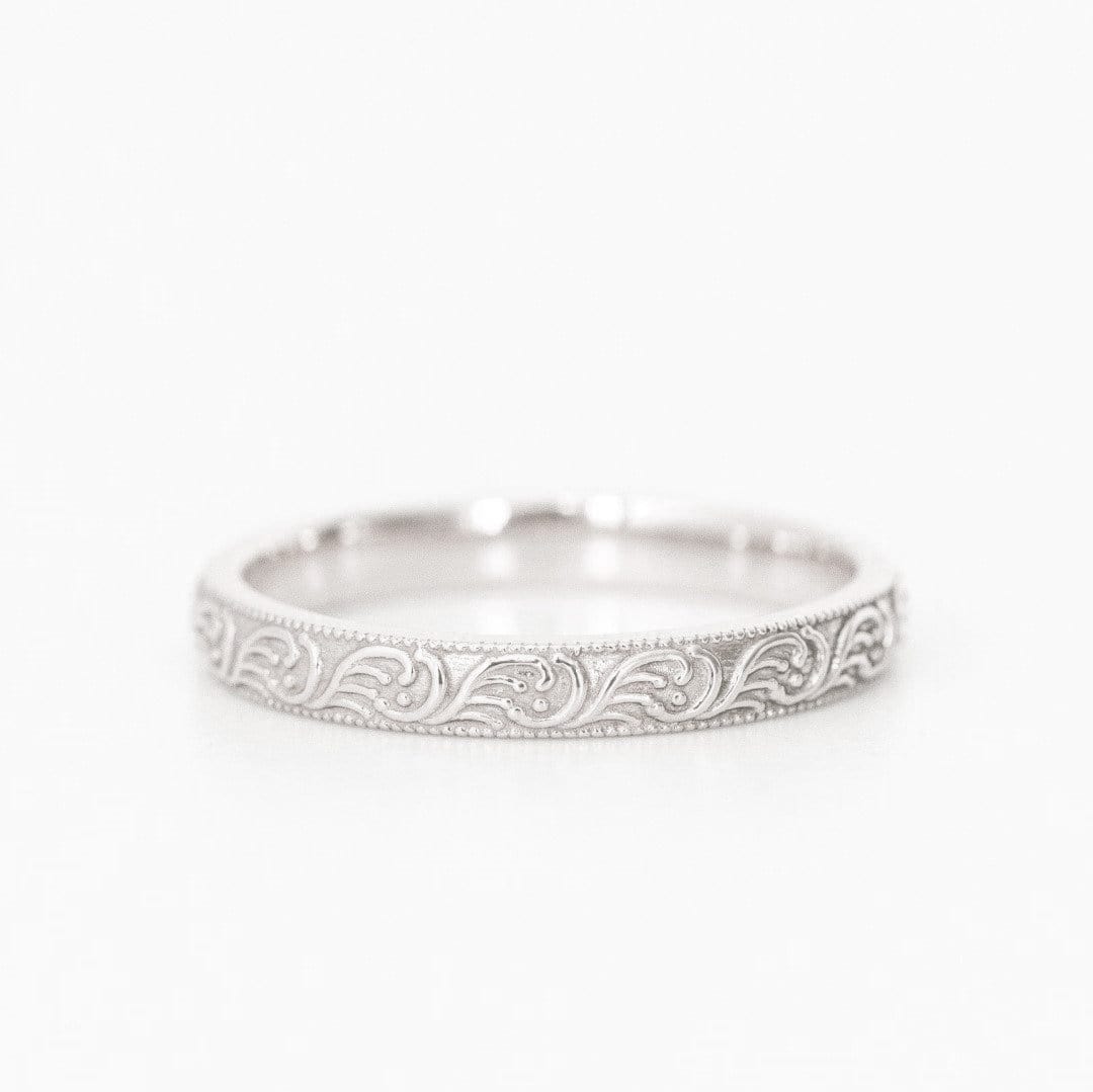 white gold patterned wedding band