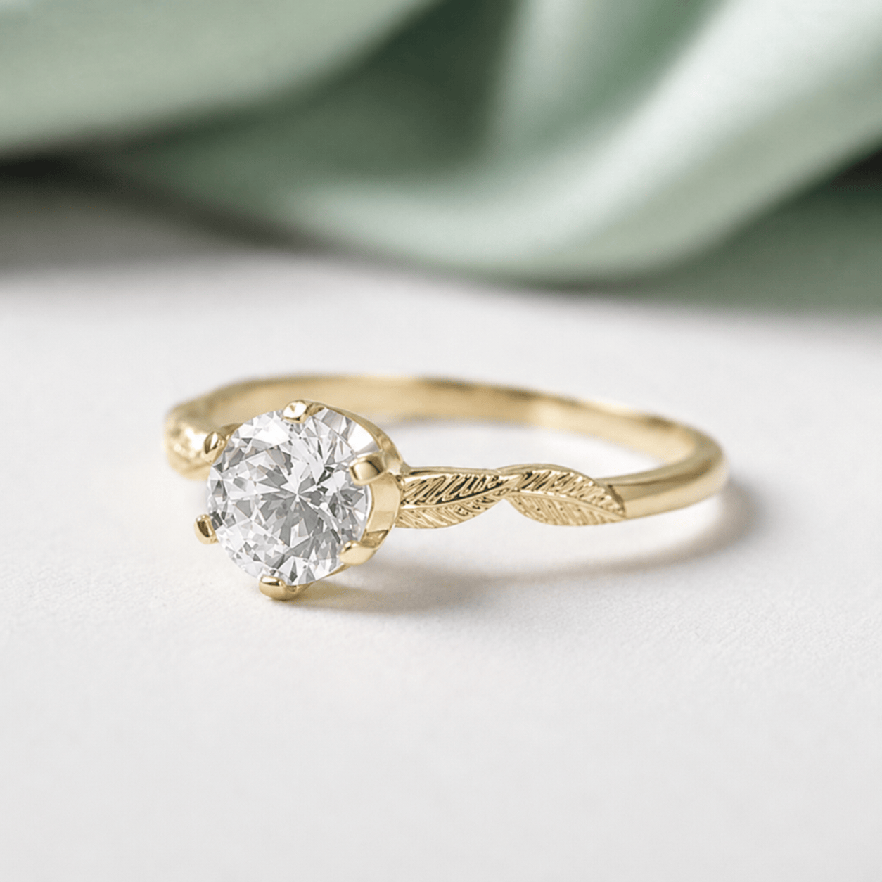 yellow gold solitaire leaf engagement ring