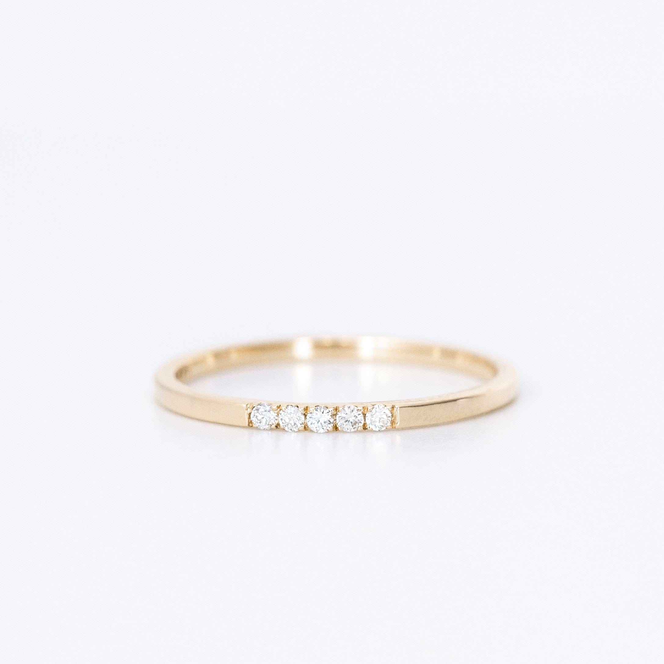 Dainty gold ring with small deals diamond