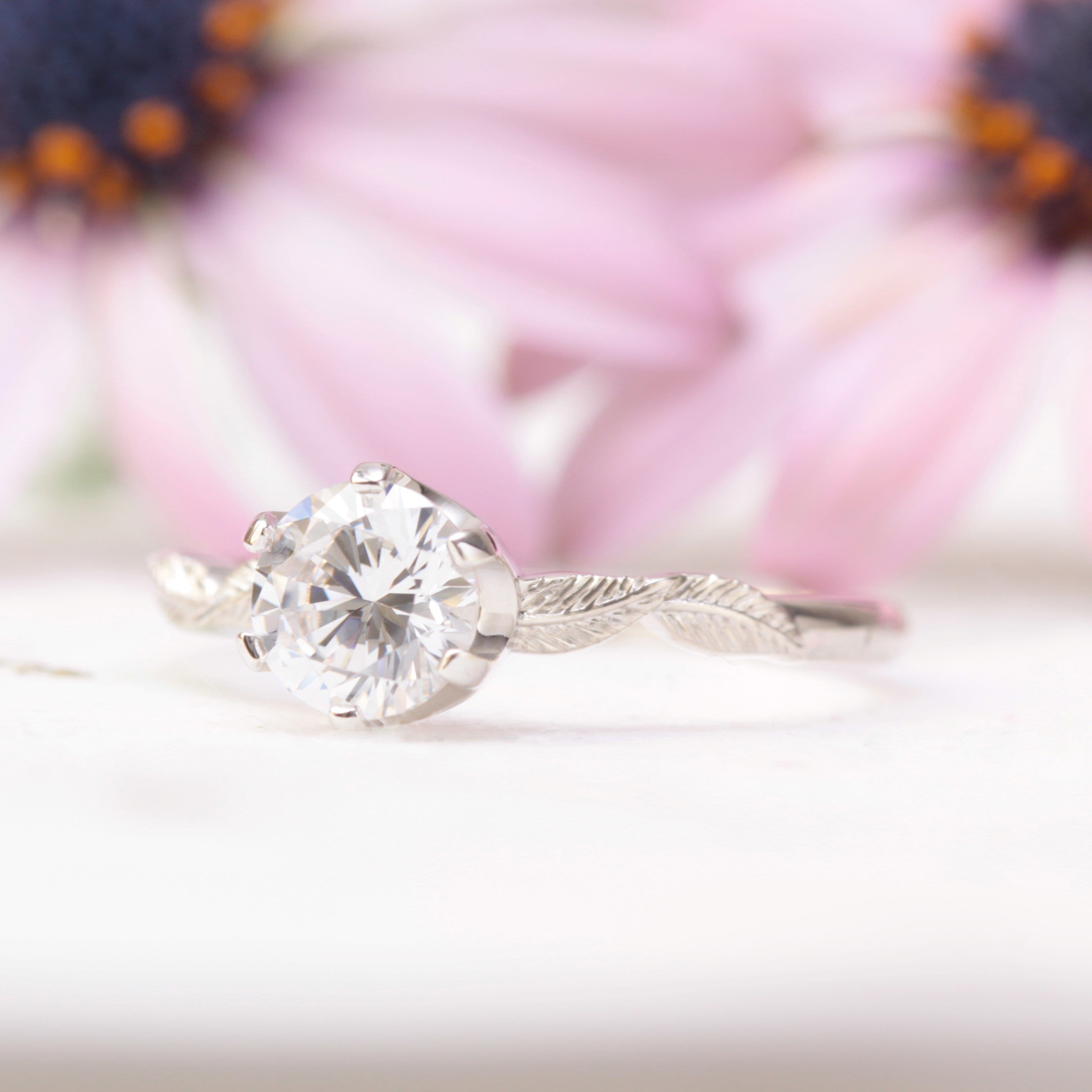 Pink solitaire diamond deals ring